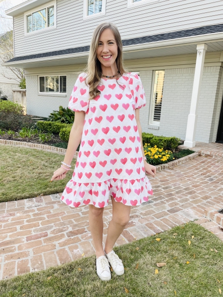 woman in heart patterned dress